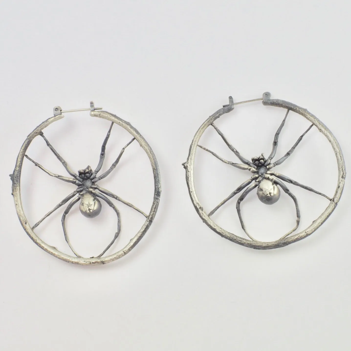 Wolf spider hoop earrings